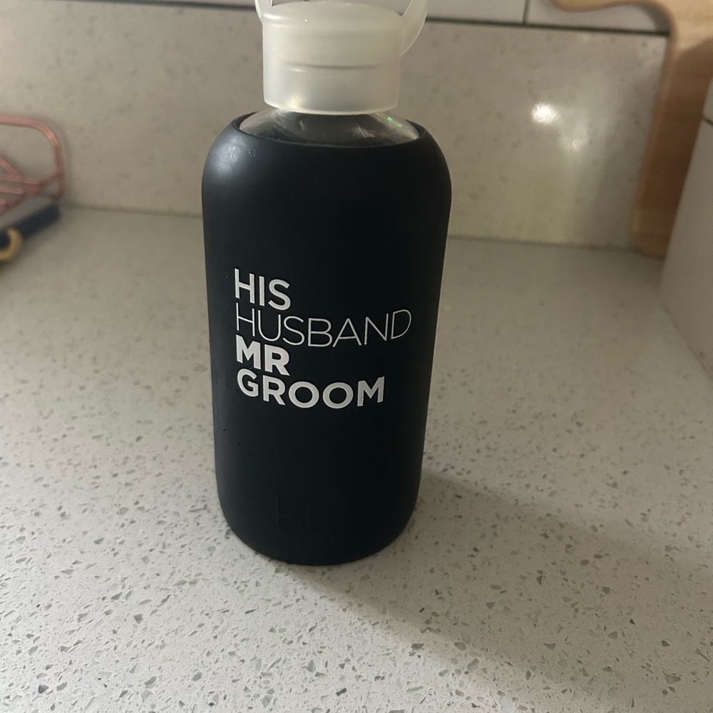 Black Grooming Bottle